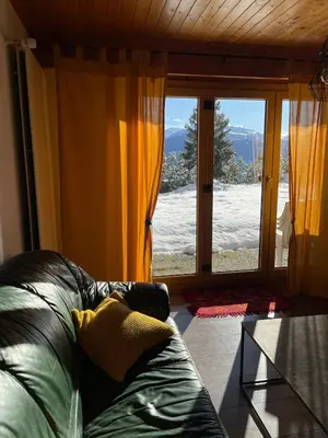 Ein Sitzbereich in der Unterkunft Anzère appartement de vacances calme et sympa