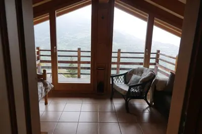 Ein Sitzbereich in der Unterkunft Chalet Isabella - 17 couchages en montagne