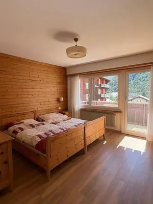Ein Bett oder Betten in einem Zimmer der Unterkunft Salü 5
