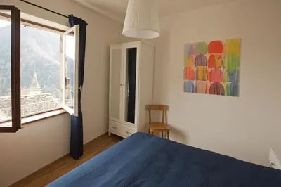 Ein Bett oder Betten in einem Zimmer der Unterkunft Casa Onsernone in Comologno