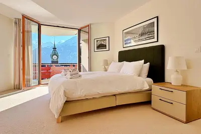 Ein Bett oder Betten in einem Zimmer der Unterkunft Eiger Residence 2