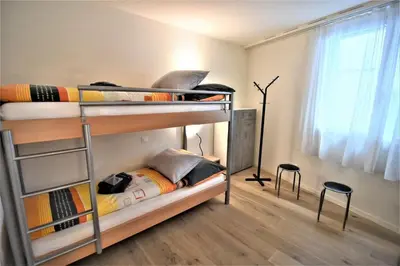 Ein Bett oder Betten in einem Zimmer der Unterkunft In the Heart of Interlaken