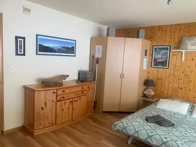 Ein Bett oder Betten in einem Zimmer der Unterkunft Studio Mont Rouge Veysonnaz 4 Vallées