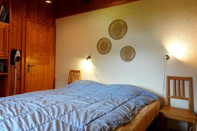 Ein Bett oder Betten in einem Zimmer der Unterkunft Résidence d'Evolène
