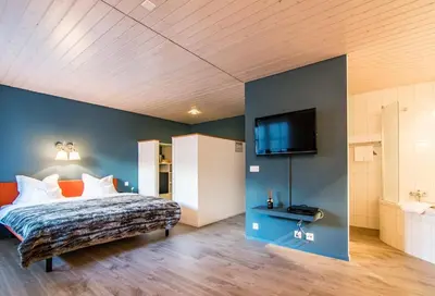 Ein Bett oder Betten in einem Zimmer der Unterkunft Private Whole-Hotel in Saas-Fee 360 Alpine Views Sauna & Hot Tub