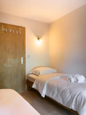 Ein Bett oder Betten in einem Zimmer der Unterkunft Alpine Retreat