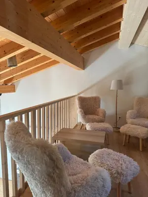 Ein Sitzbereich in der Unterkunft Chalet Gadmer Herz