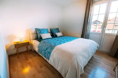 Ein Bett oder Betten in einem Zimmer der Unterkunft Cozy Apartment in Spiez with fantastic view