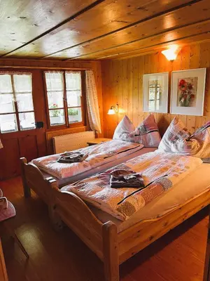 Ein Bett oder Betten in einem Zimmer der Unterkunft BnB Haus Itten