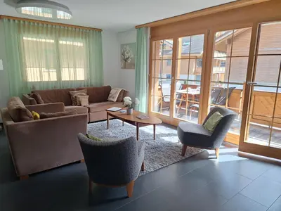 Ein Sitzbereich in der Unterkunft Chalet Valentine