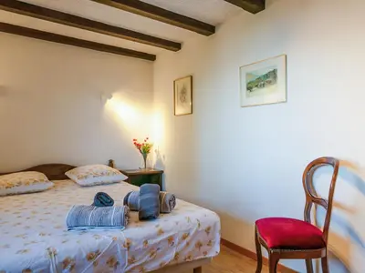 Ein Bett oder Betten in einem Zimmer der Unterkunft Les Cassis