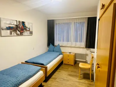 Ein Bett oder Betten in einem Zimmer der Unterkunft Haus Sonnmatt