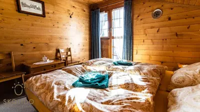 Ein Bett oder Betten in einem Zimmer der Unterkunft Haus Chämihitta, Riederalp Moosfluh