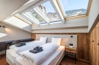 Ein Bett oder Betten in einem Zimmer der Unterkunft Viscaria Penthouse with amazing Matterhorn View