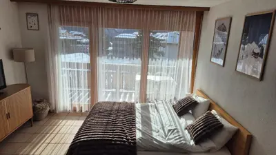 Ein Bett oder Betten in einem Zimmer der Unterkunft Summit & Spring Studio - Leukerbad