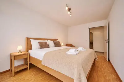 Ein Bett oder Betten in einem Zimmer der Unterkunft Chalet in Thun, modern, spacious, perfect location