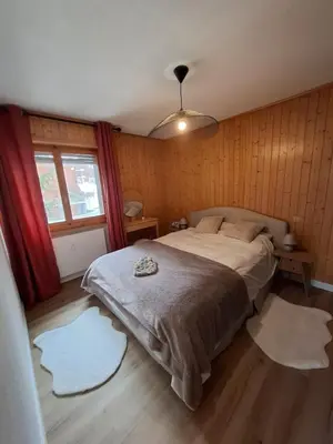 Ein Bett oder Betten in einem Zimmer der Unterkunft The Edelweiss - Cozy apartment in Anzère