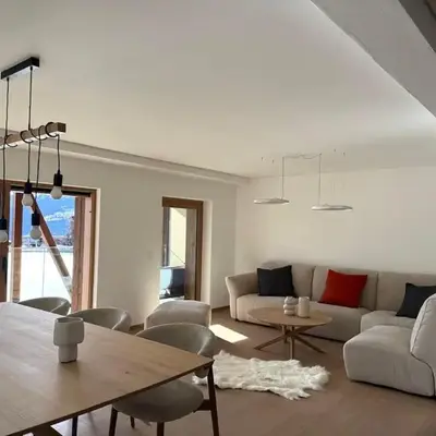 Cozy Crans-Montana Apt with Lake and Mountain View