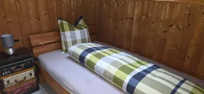 Ein Bett oder Betten in einem Zimmer der Unterkunft Wohnung in Reichenbach im Kandertal