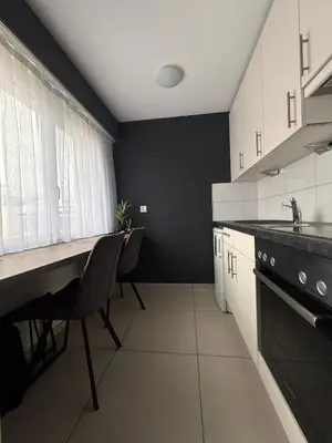 Küche/Küchenzeile in der Unterkunft Moderne Wohnung mit Bergblick und nahe Thunersee