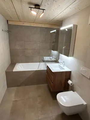 Ein Badezimmer in der Unterkunft New apartment with view