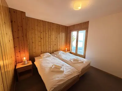 Ein Bett oder Betten in einem Zimmer der Unterkunft Fontannets 001 COSY & MOUNTAIN chalet 10 pers