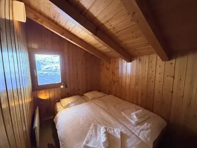 Ein Bett oder Betten in einem Zimmer der Unterkunft Fontannets 001 COSY & MOUNTAIN chalet 10 pers