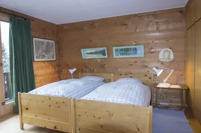 Ein Bett oder Betten in einem Zimmer der Unterkunft Chalet Cresta di Saas
