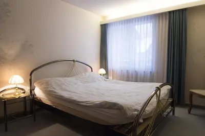 Ein Bett oder Betten in einem Zimmer der Unterkunft Waldrain 2
