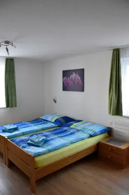 Ein Bett oder Betten in einem Zimmer der Unterkunft Haus Amasaas