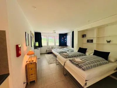 Ein Bett oder Betten in einem Zimmer der Unterkunft Studio Collinetta