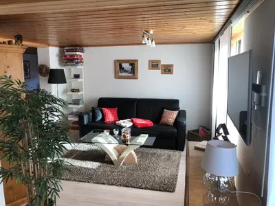 Ein Sitzbereich in der Unterkunft Ferienwohnung Milchgaessli