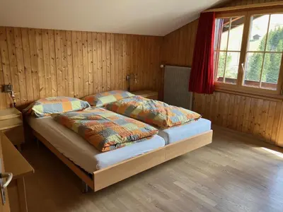 Ein Bett oder Betten in einem Zimmer der Unterkunft Apartment Gilbachhöckli 2 by Interhome