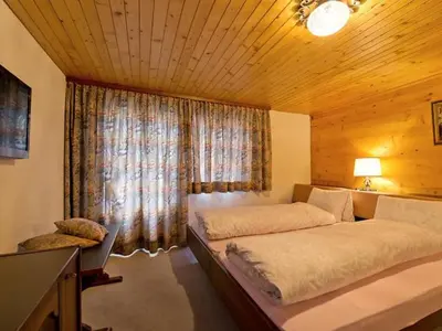 Ein Bett oder Betten in einem Zimmer der Unterkunft Apartment Maria by Interhome