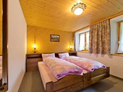 Ein Bett oder Betten in einem Zimmer der Unterkunft Apartment Maria by Interhome