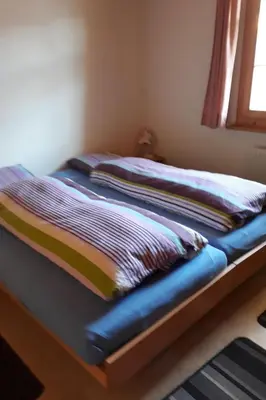 Ein Bett oder Betten in einem Zimmer der Unterkunft Apartment Adlerhorst by Interhome