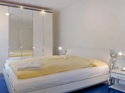 Ein Bett oder Betten in einem Zimmer der Unterkunft Apartment Goldenhorn Apt-F by Interhome