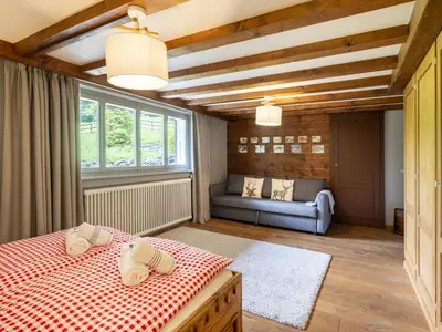 Ein Bett oder Betten in einem Zimmer der Unterkunft Chalet Chalet am Schärm by Interhome