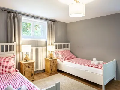 Ein Bett oder Betten in einem Zimmer der Unterkunft Chalet Chalet am Schärm by Interhome