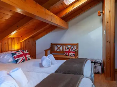 Ein Bett oder Betten in einem Zimmer der Unterkunft Holiday Home Le Dahu by Interhome