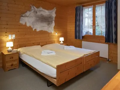 Ein Bett oder Betten in einem Zimmer der Unterkunft Apartment Chäs Gruebi Apt-S by Interhome