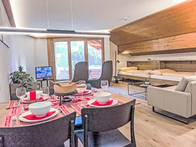 Ein Sitzbereich in der Unterkunft Apartment Eiger Residence Apt-A-425 by Interhome