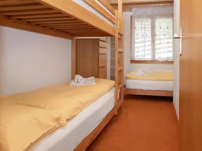 Ein Bett oder Betten in einem Zimmer der Unterkunft Apartment Racer's Retreat Apt-12 by Interhome