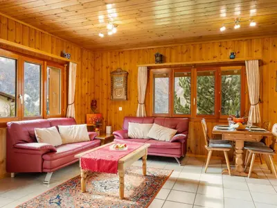 Ein Sitzbereich in der Unterkunft Chalet Als man zählte 1989 by Interhome