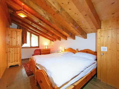 Ein Bett oder Betten in einem Zimmer der Unterkunft Apartment Vitalis by Interhome