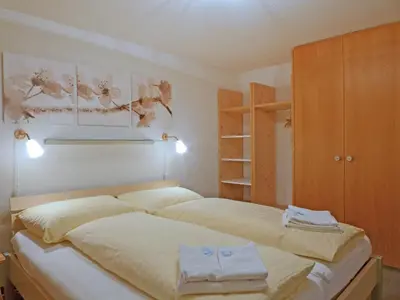 Ein Bett oder Betten in einem Zimmer der Unterkunft Apartment Schoneggacher Apt- S by Interhome