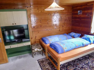 Ein Bett oder Betten in einem Zimmer der Unterkunft Apartment Heiderösli-2 by Interhome