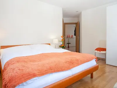 Ein Bett oder Betten in einem Zimmer der Unterkunft Apartment A31 by Interhome