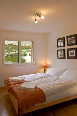 Ein Bett oder Betten in einem Zimmer der Unterkunft Apartment A31 by Interhome