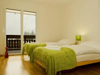 Ein Bett oder Betten in einem Zimmer der Unterkunft Apartment A31 by Interhome